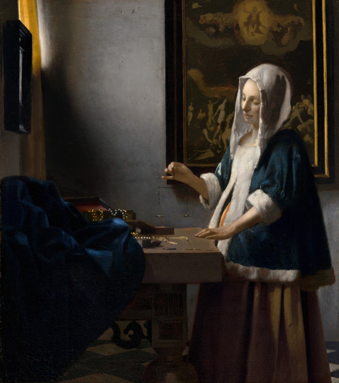 Mulher segurando um equilíbrio de Johannes Vermeer