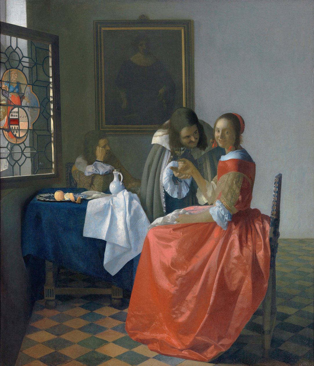 Mulher jovem com um copo de vinho de Johannes Vermeer