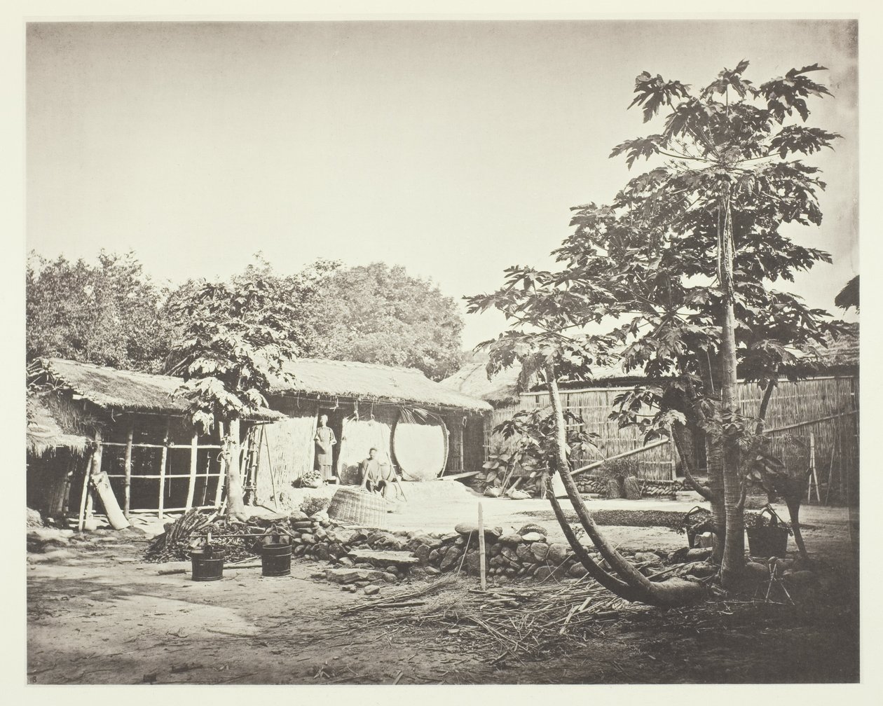Uma habitação de Pepohoan de John Thomson