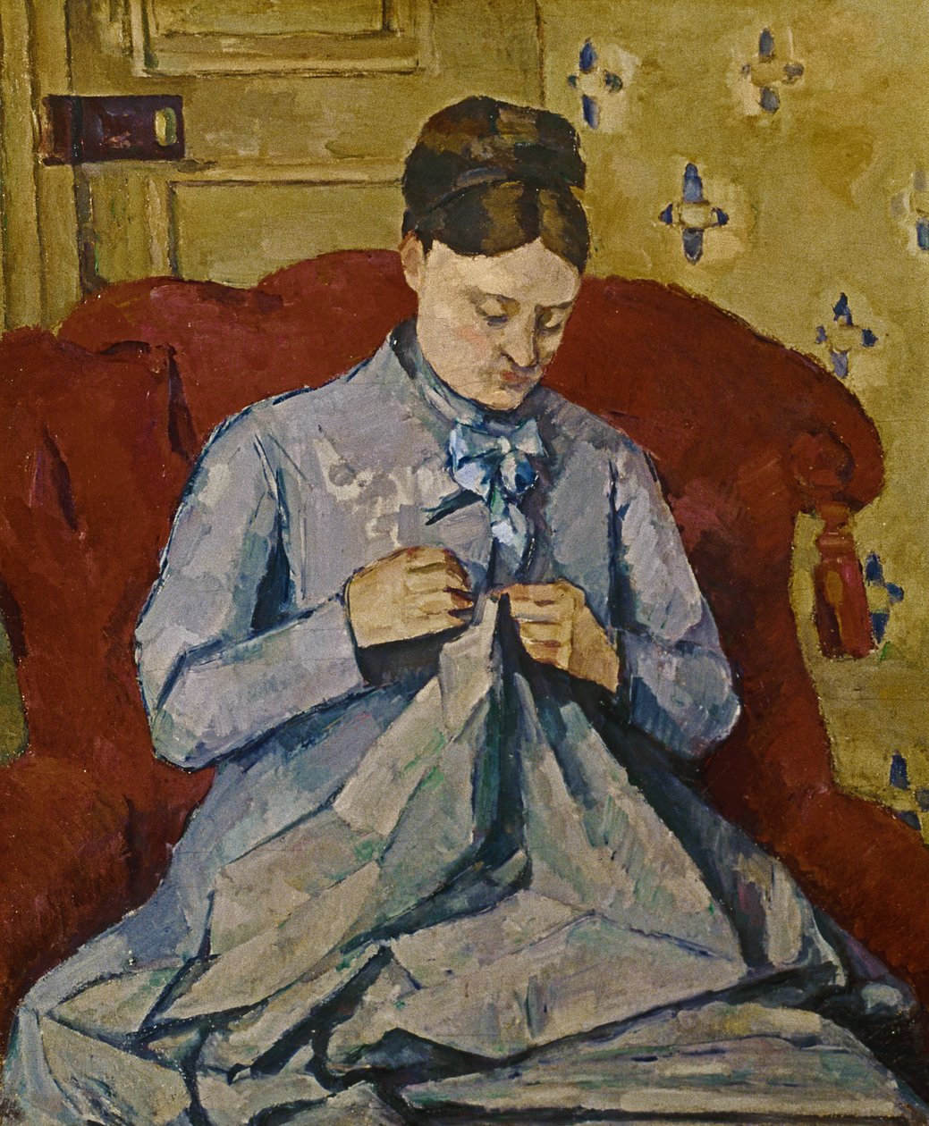 Madame Cezanne costura de Paul Cézanne