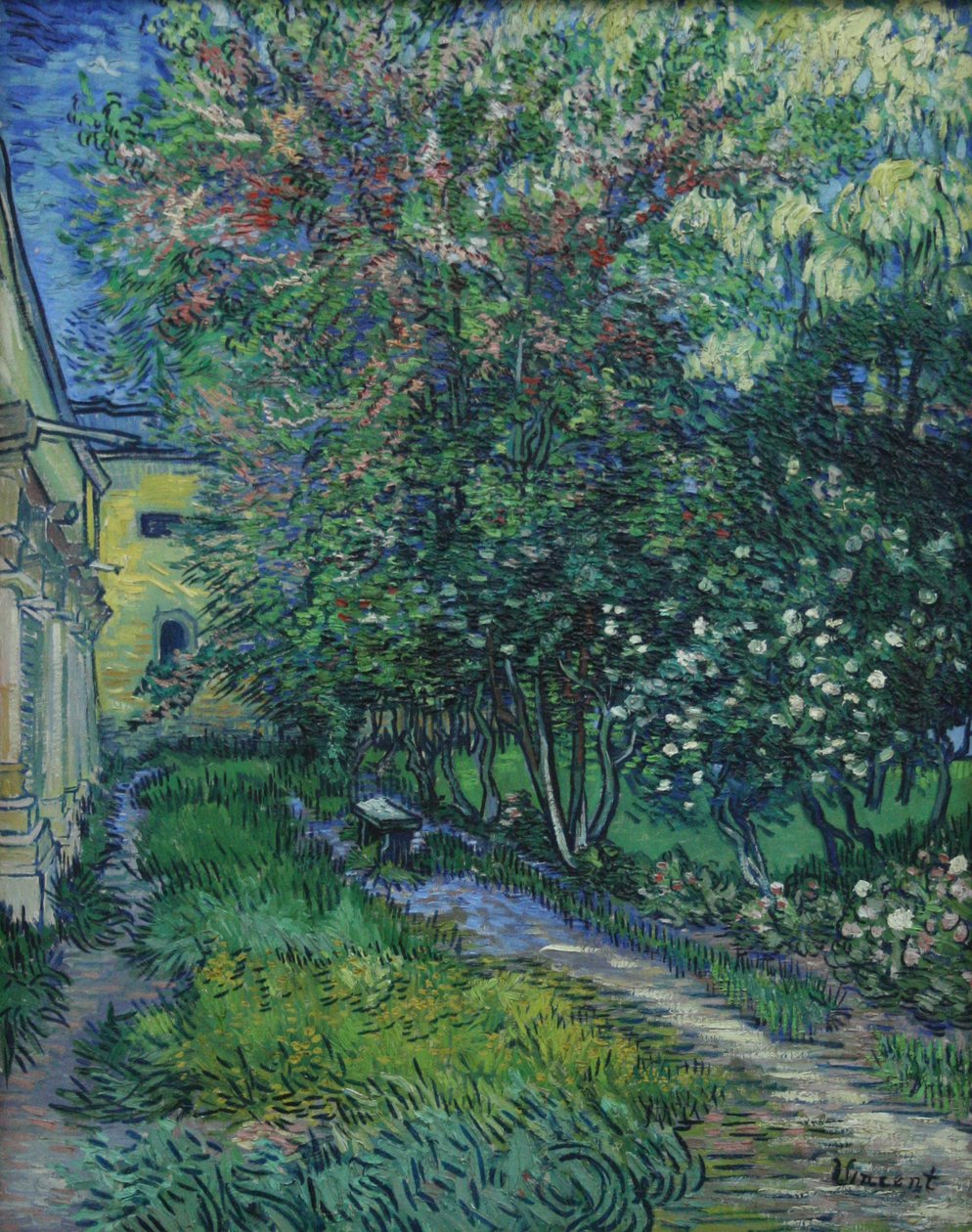O jardim do interior em Saint-Rémy de Vincent van Gogh